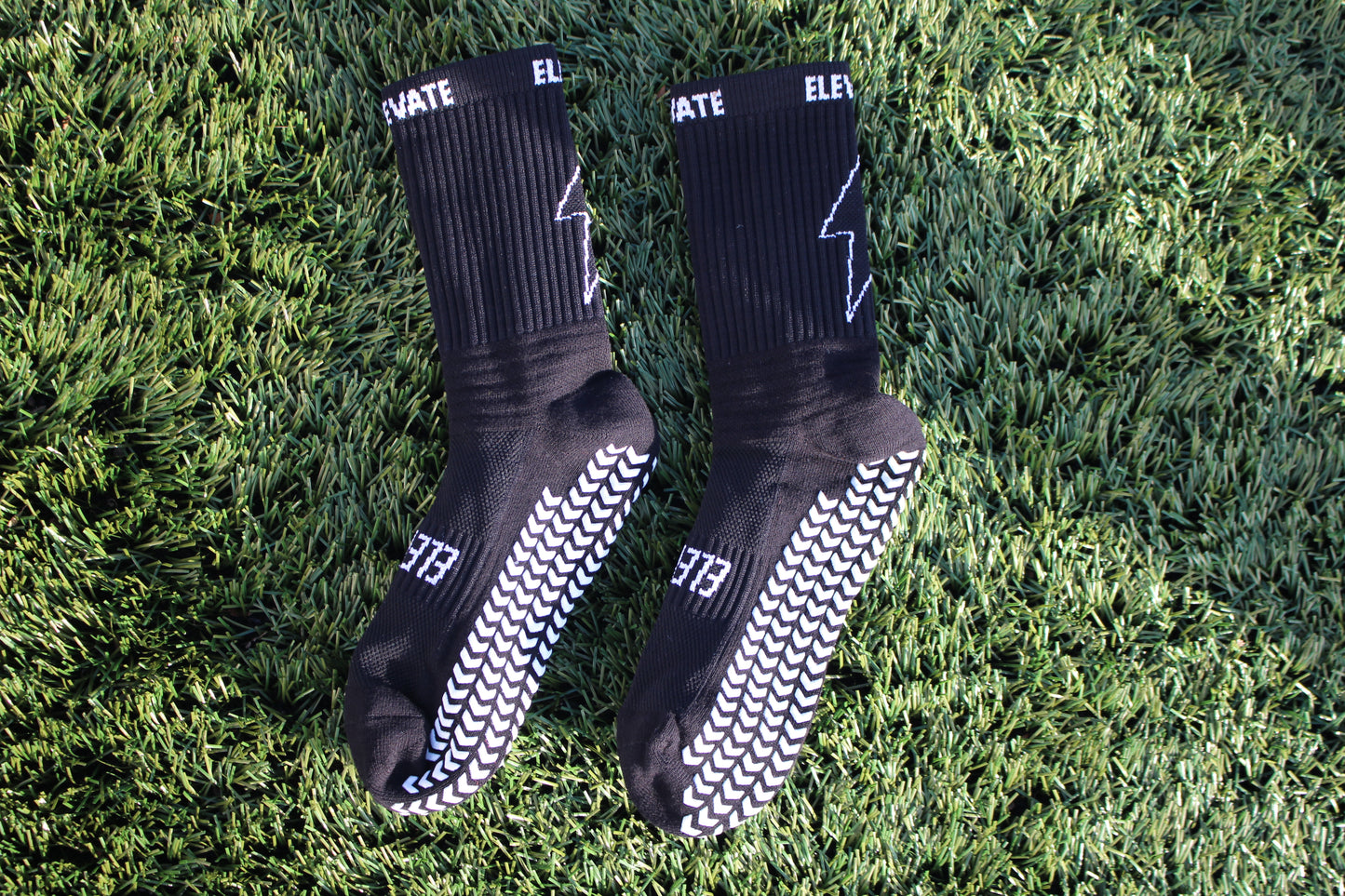 Elevate Grip Socks - Black with white grips.