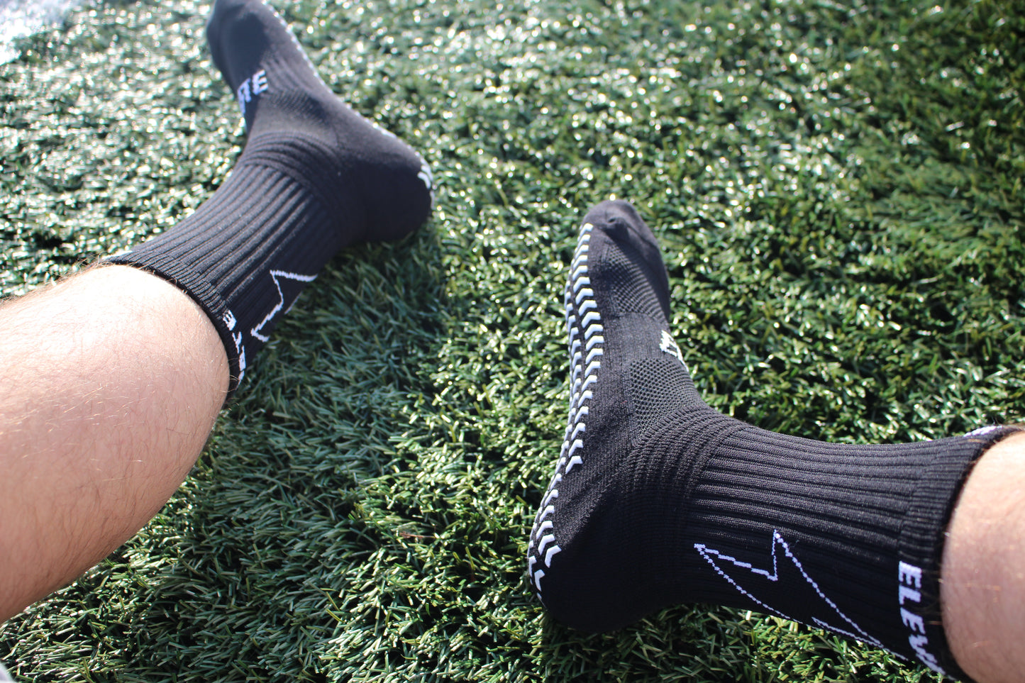 Elevate Grip Socks - Black with white grips.